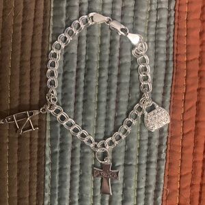 Silver Charm Bracelet with Cross Canoe and Purse Charms